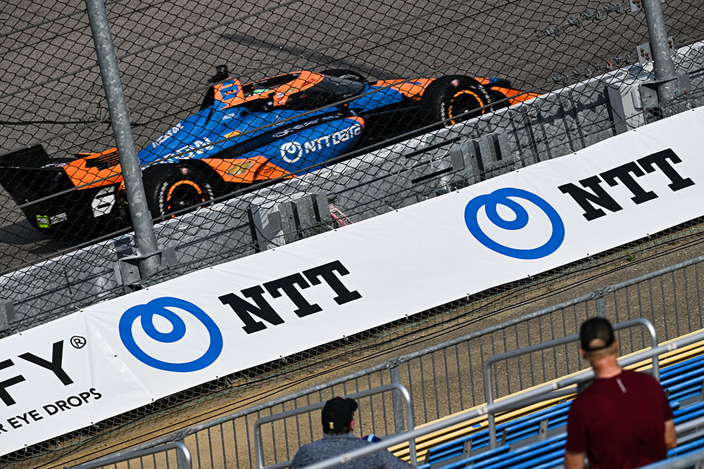 Signage on the grandstand side of the track wall