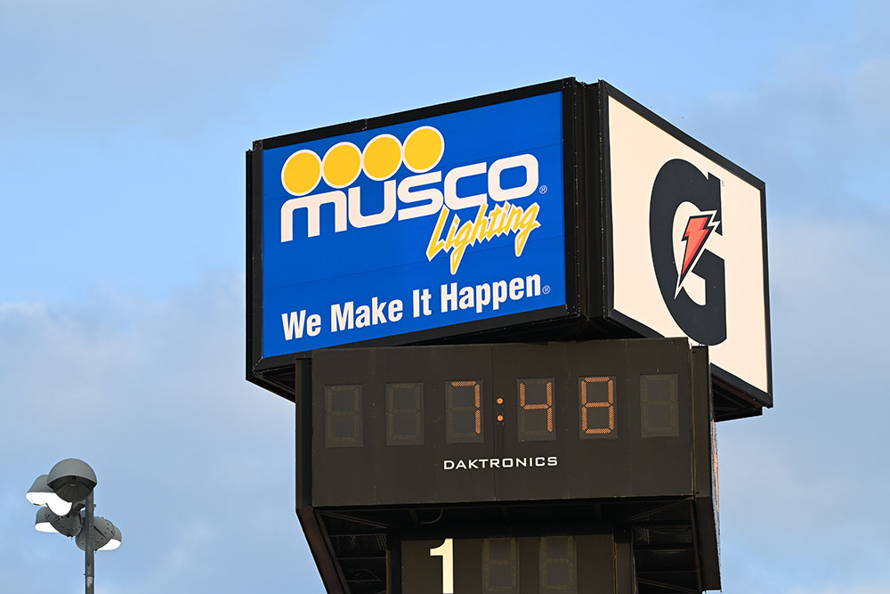 Signage on the rotating top of the scoring pylon